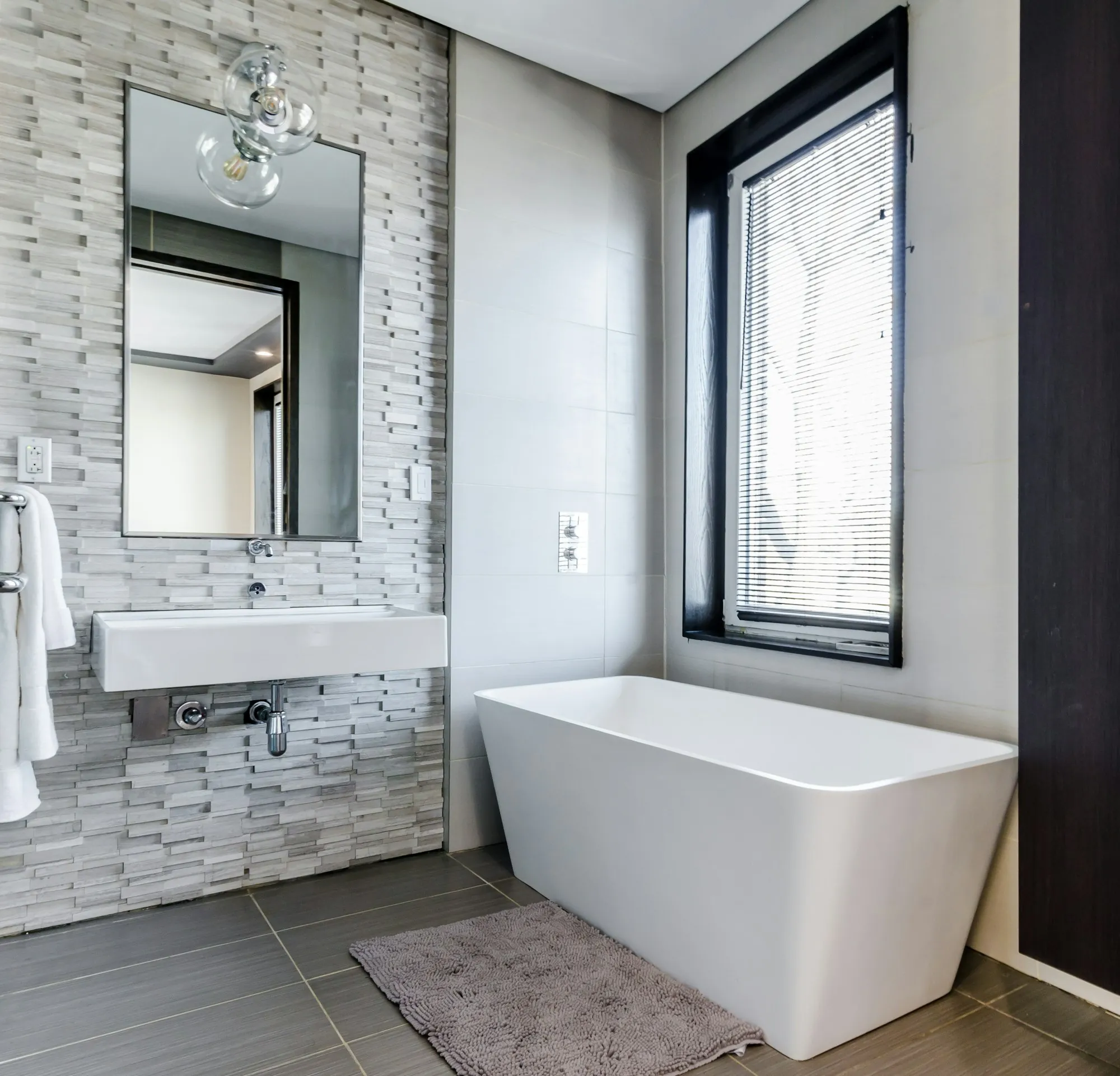 Remodeled bathroom with new tile